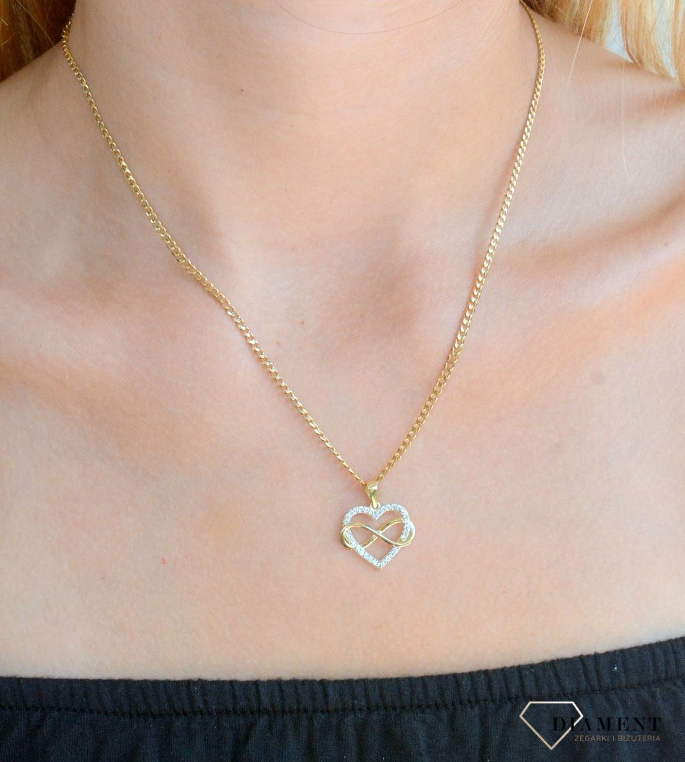 Złota zawieszka 375 serduszko ze znakiem nieskończoności ZA 3432A 375. Złota zawieszka serduszko z cyrkoniami. Zawieszka złota damska. Złoty damski wisiorek. Złota zawieszka nieskończoność.Zawieszka złota na pr.jpg